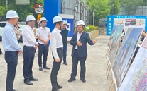 大渡口区常务副区长谢小刚调研k8.com中心项目，共破建设难题促发展